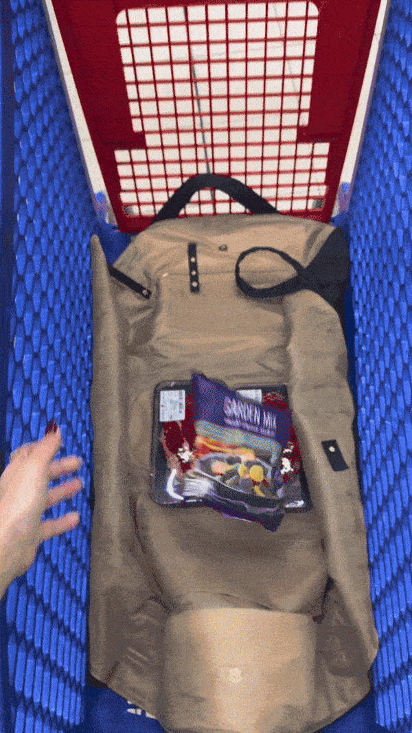 <strong>2. Fill it </strong>— <em>Load groceries straight in as you go. It holds a full weekly shop</em>